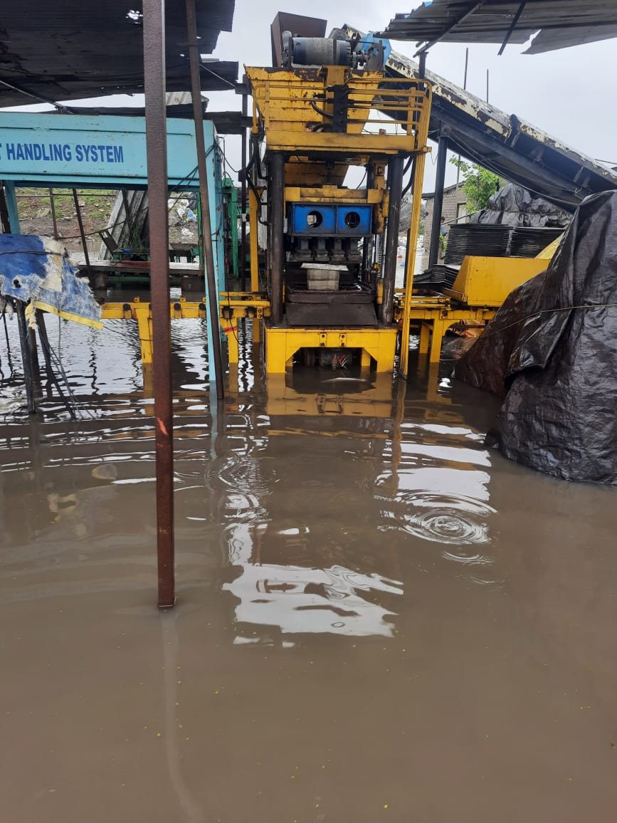Block-making press at the Dhamra site plant standing in floodwater