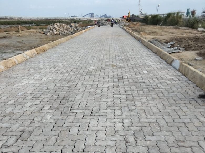 Finished M-50 unipaver road with kerbs at Dhamra Port, Odisha