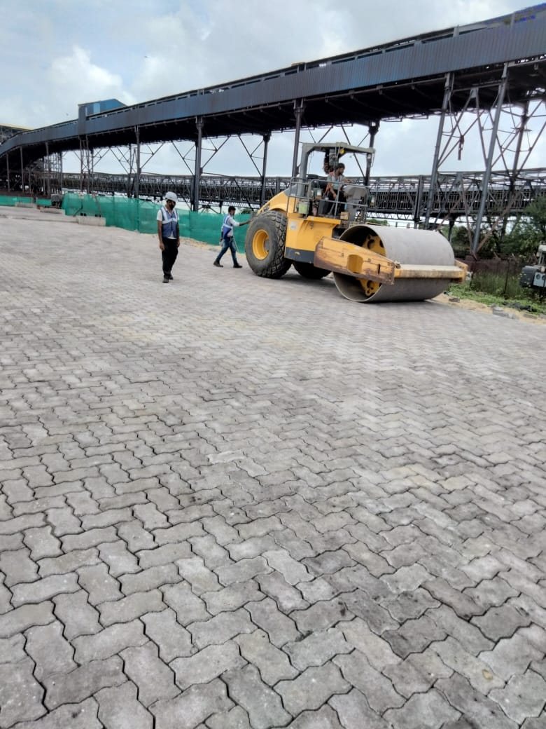 Vibratory roller working in the paved steel stackyard at Dhamra Port