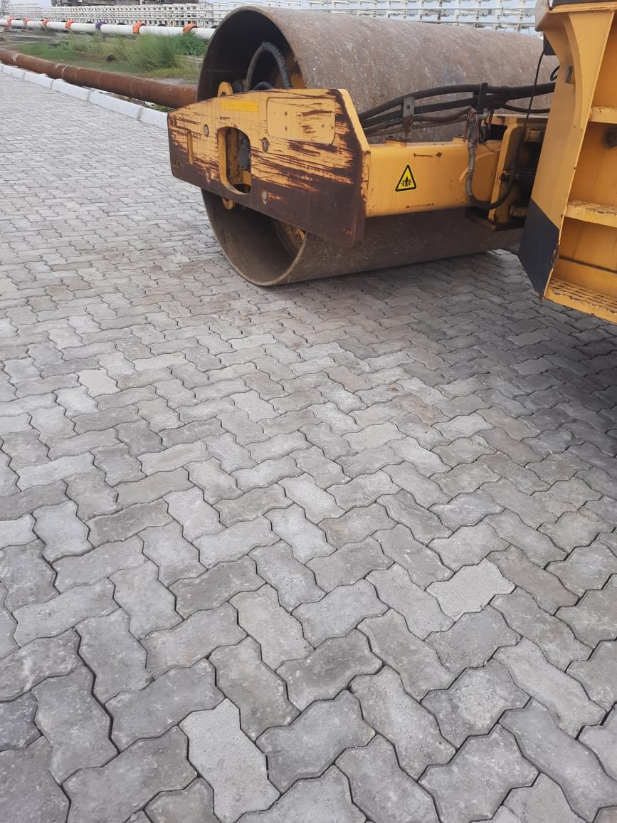 Close view of a vibratory roller drum on M-50 unipavers at Dhamra