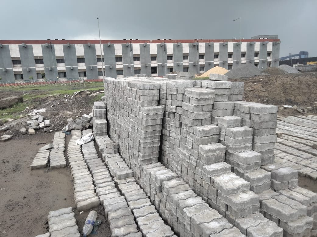Cured paver blocks stacked at the Dhamra site yard