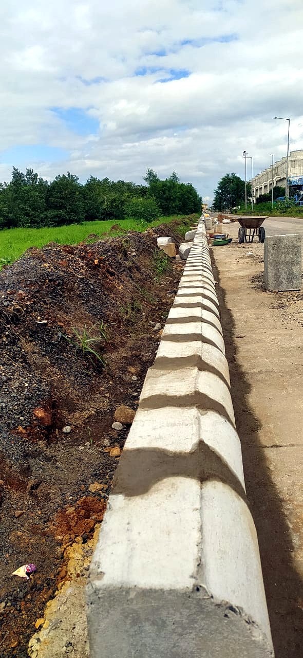 Precast kerb stones fixed along a road