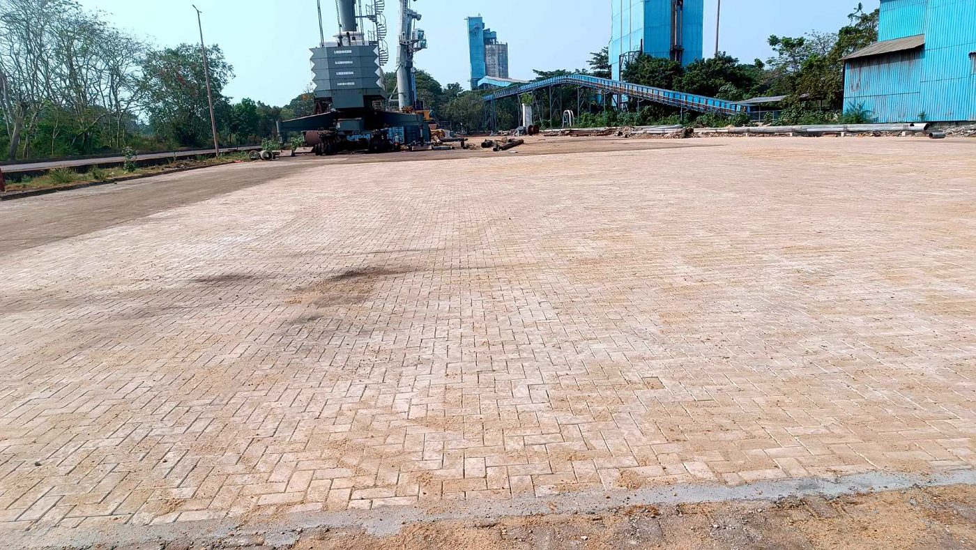 After repair at NMPA — the yard re-laid to a level paver surface with sand-filled joints